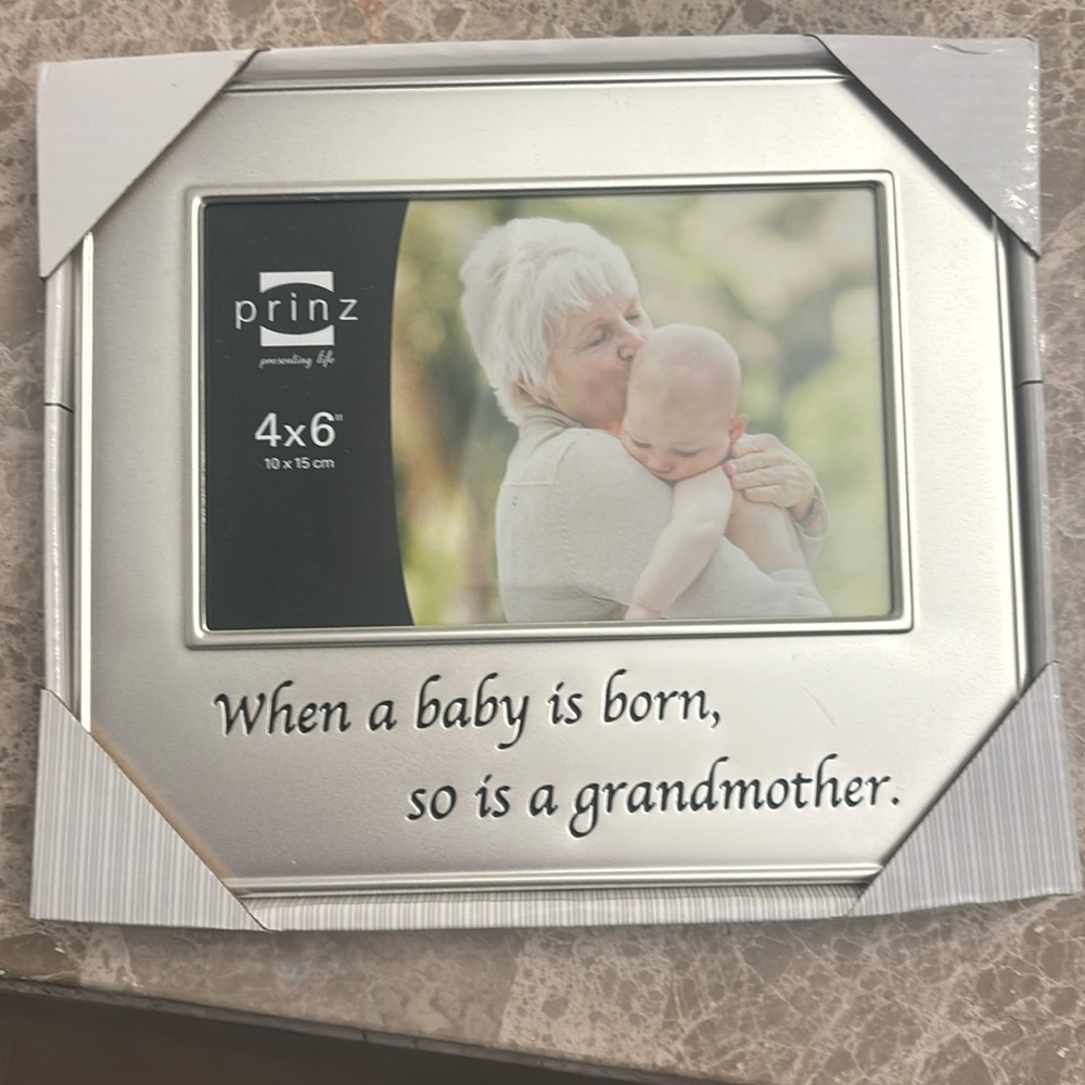 When a baby is born so is a grandmother 4x6 picture frame.